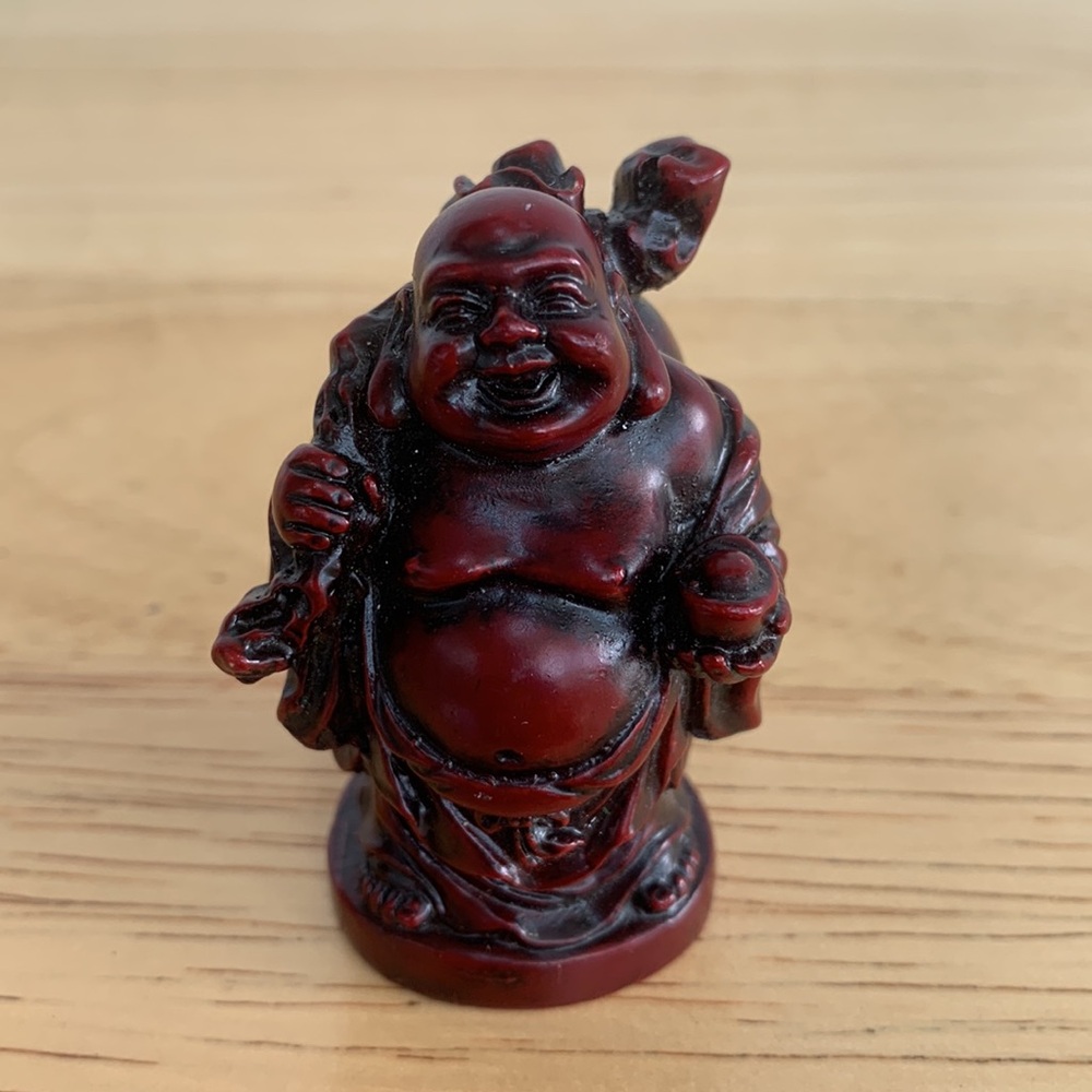 Red Laughing Buddha Figurine. Resin. About 2 inches tall
